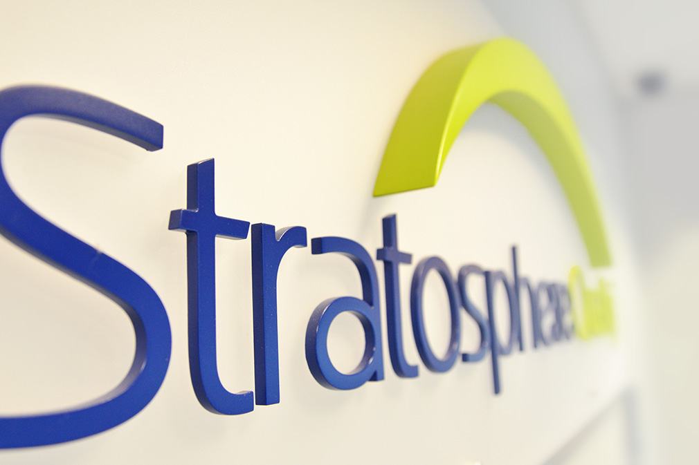 Stratosphere logo sign on wall